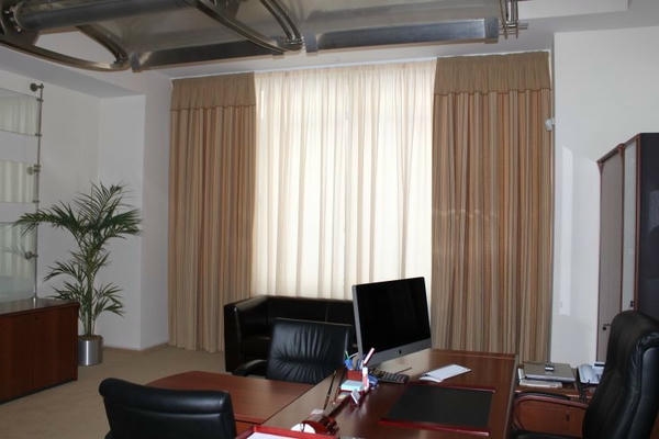 curtain install in office room