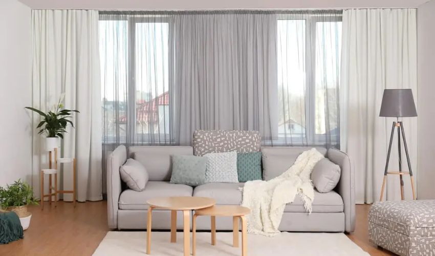 blackout and sheer curtains install in living room