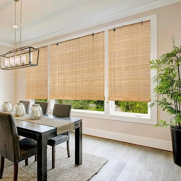 Large bamboo blinds hanging in a spacious Dubai villa