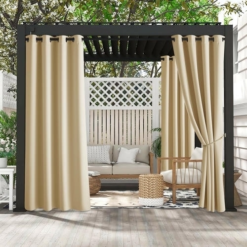 Outdoor seating area curtains for privacy
